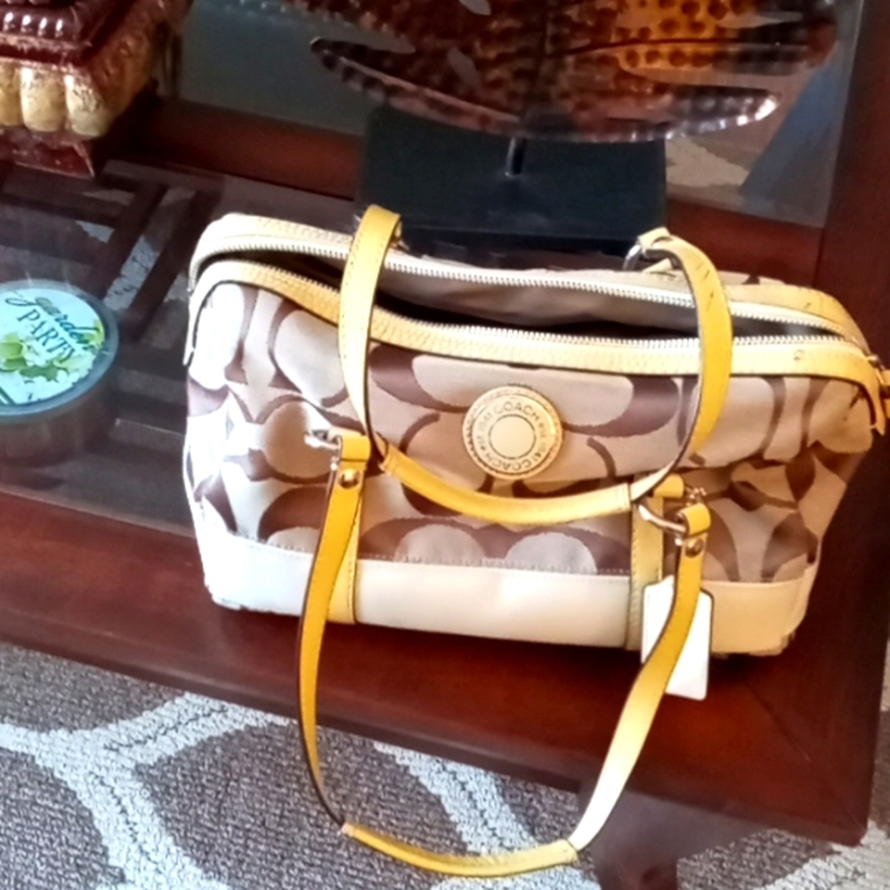 Beige/tan coach purse